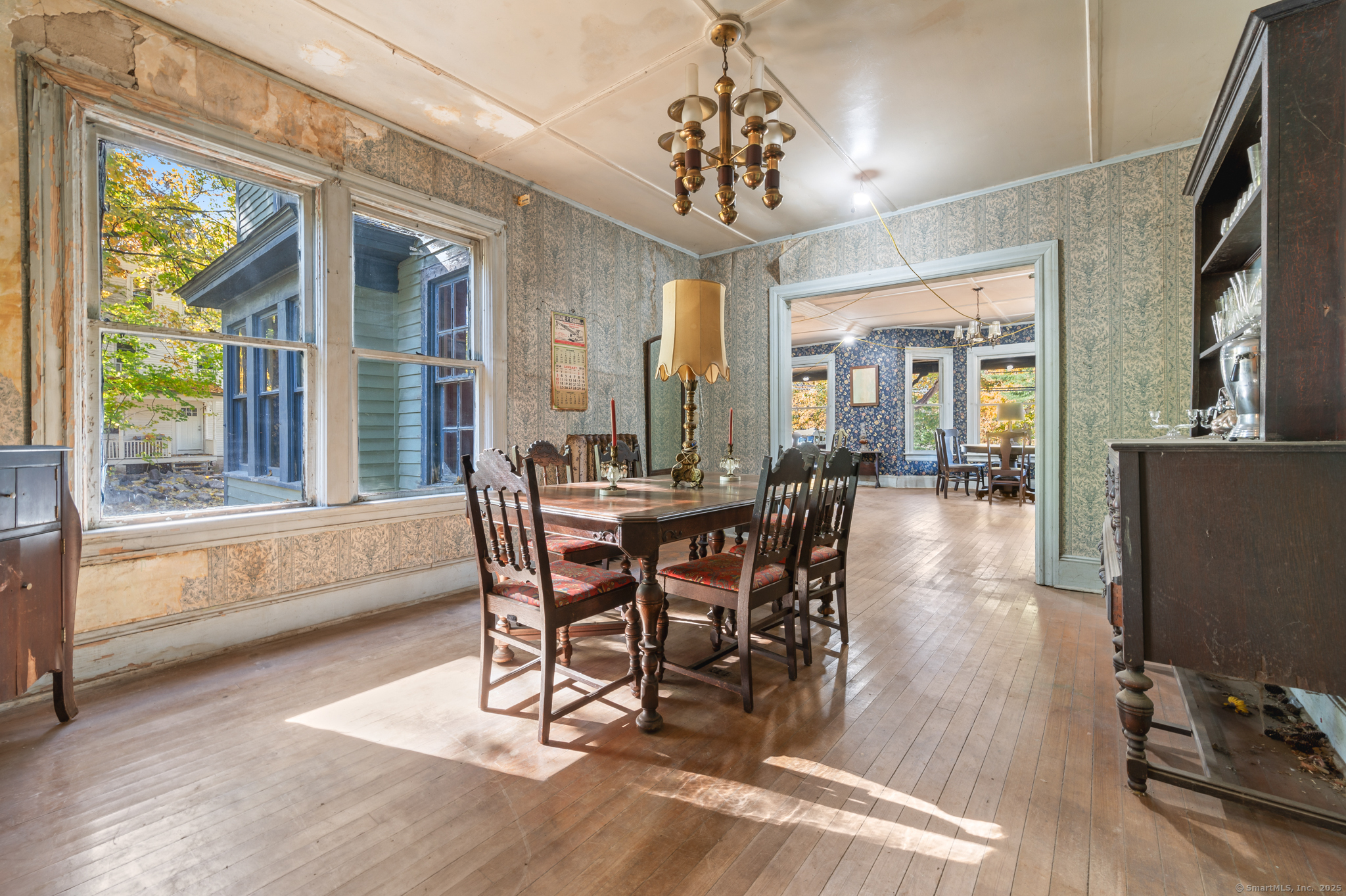 124 River Road Willington, CT 06279 - Photo 17 of 38 a view of a dining room with furniture window and wooden floor