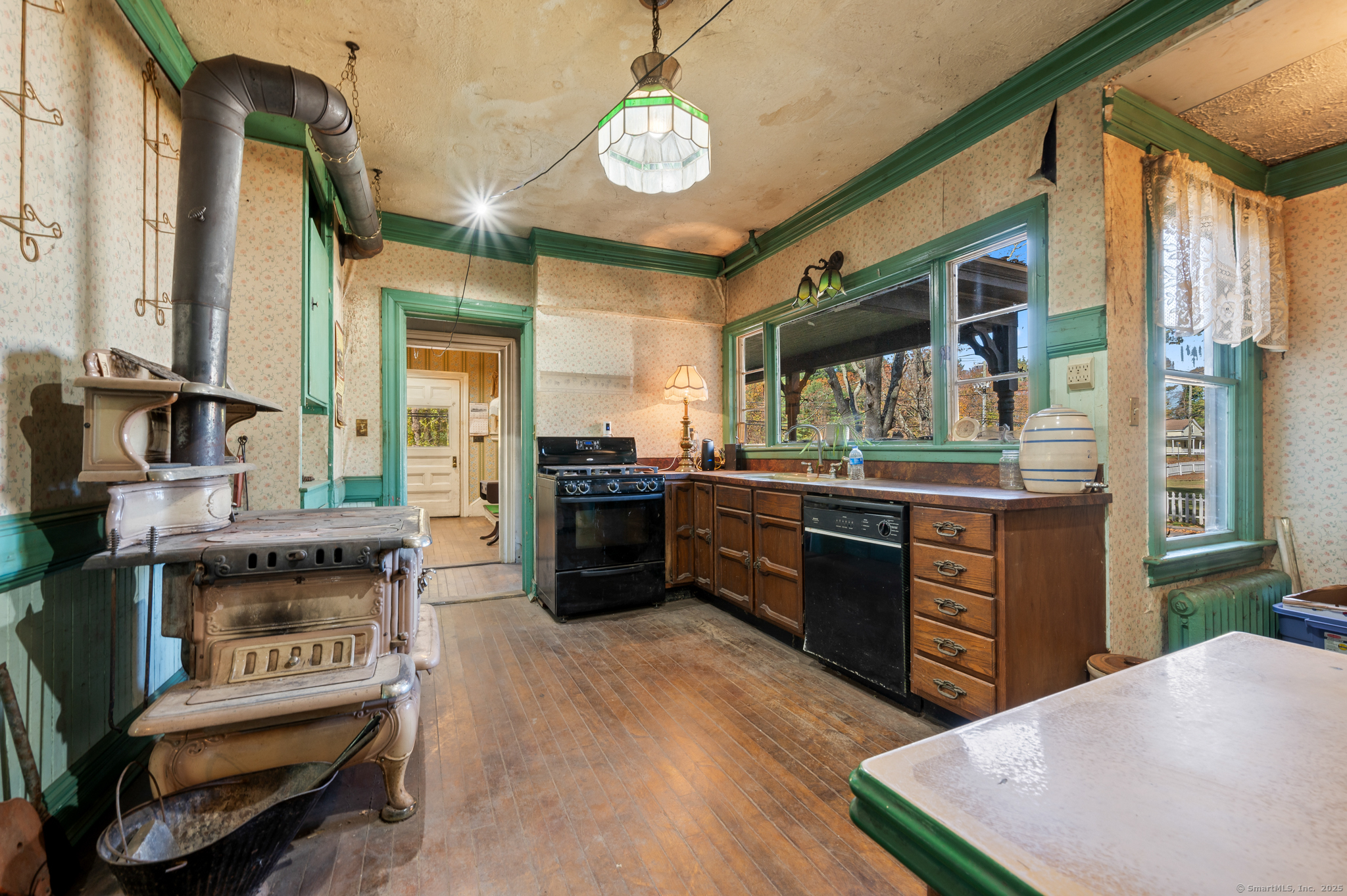 124 River Road Willington, CT 06279 - Photo 21 of 38 a kitchen with stainless steel appliances granite countertop a stove and a sink