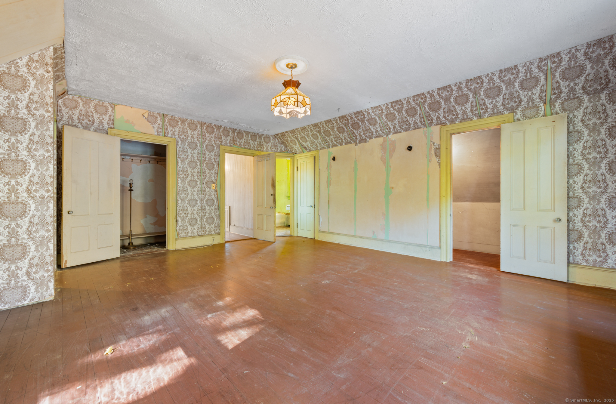 124 River Road Willington, CT 06279 - Photo 27 of 38 a view of an empty room with closet and a window