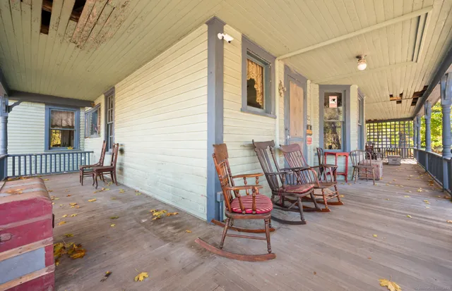 a view of a livingroom with furniture and wooden floor