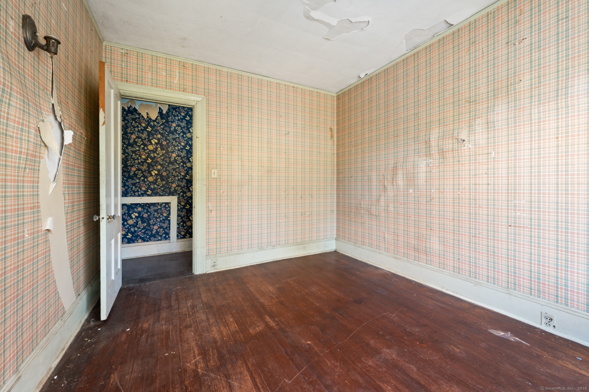 124 River Road Willington, CT 06279 - Photo 34 of 38 a view of an empty room with a window and hardwood floor