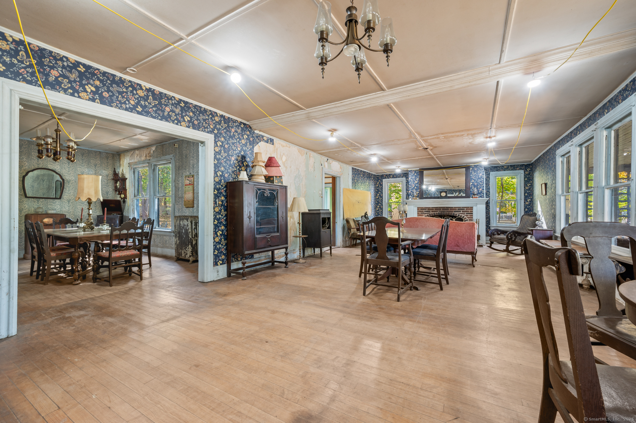 124 River Road Willington, CT 06279 - Photo 7 of 38 a view of a room with furniture and a chandelier
