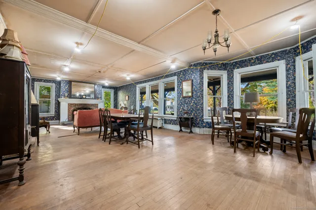 a view of a dining room with furniture window and outside view