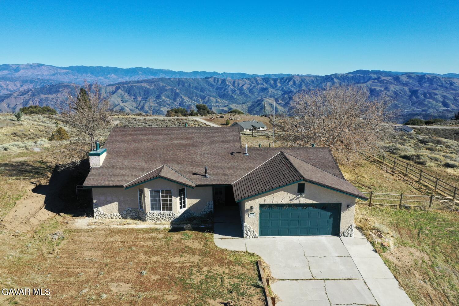 26801 Cabriolet Court Tehachapi, CA 93561 - Photo 52 of 60 a front view of a house with a yard