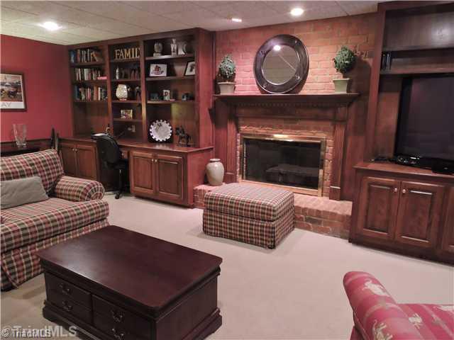 3225 Cross Tree Road Winston-Salem, NC 27106 - Photo 13 of 16 Other. Basement has Built-ins, fireplace, full bathroom and walk-out to patio