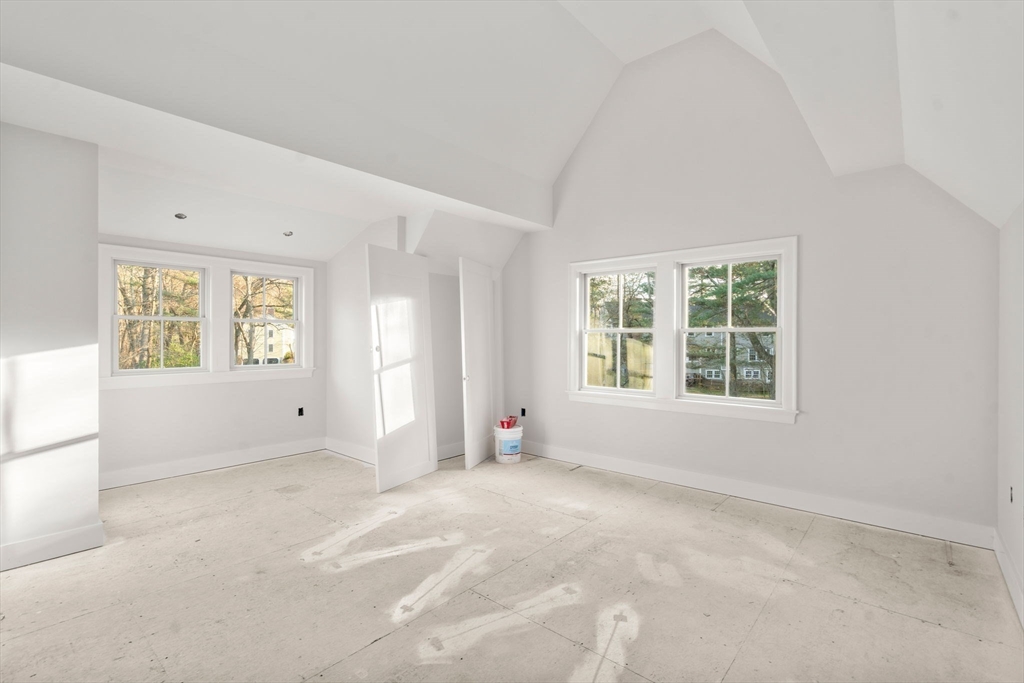 57 Longfellow Road Sudbury, MA 01776 - Photo 12 of 23 an empty room with windows