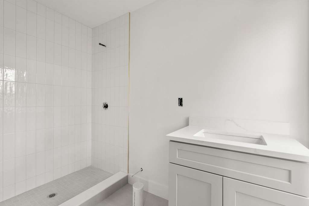 57 Longfellow Road Sudbury, MA 01776 - Photo 14 of 23 a bathroom with a sink and a mirror