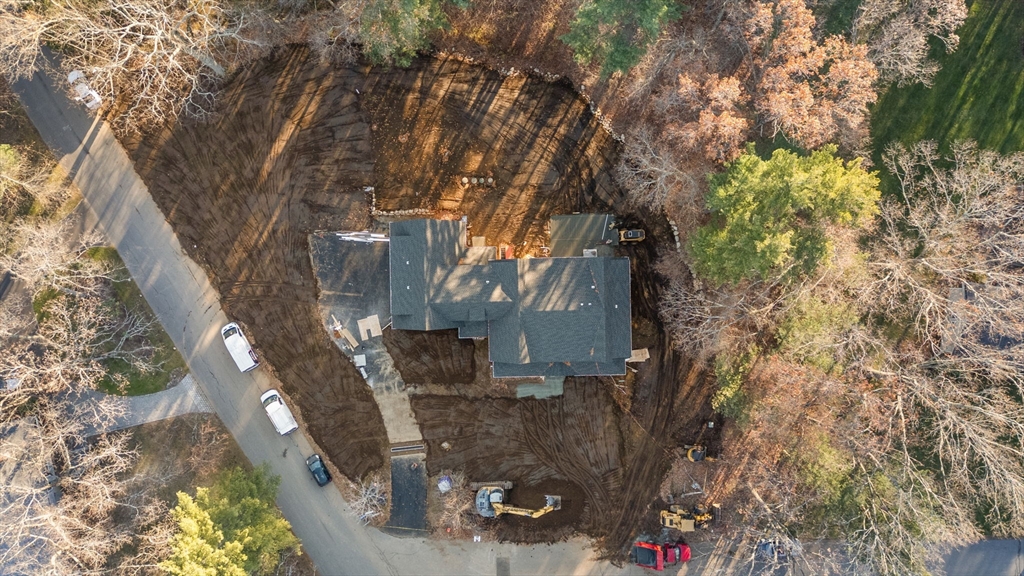 57 Longfellow Road Sudbury, MA 01776 - Photo 17 of 23 a backyard of a house with lots of green space