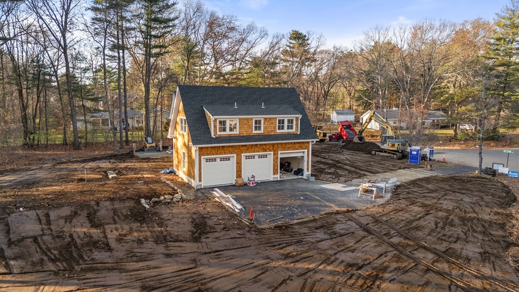 57 Longfellow Road Sudbury, MA 01776 - Photo 19 of 23 a view of a house with a yard