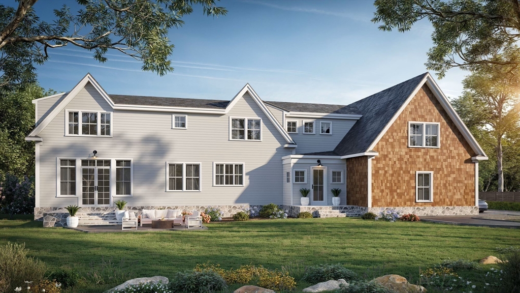 57 Longfellow Road Sudbury, MA 01776 - Photo 4 of 23 a front view of a house with a garden