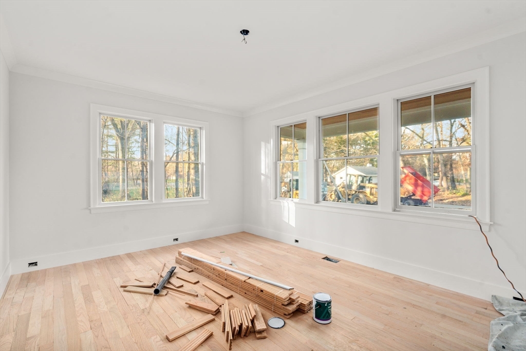 57 Longfellow Road Sudbury, MA 01776 - Photo 9 of 23 an empty room with windows