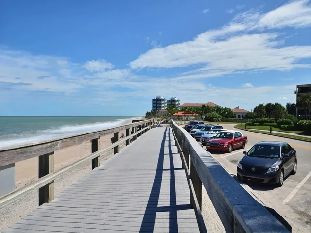 a view of roof deck with patio