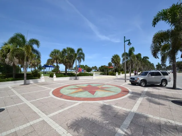 a view of outdoor space with swimming pool and lounge chair