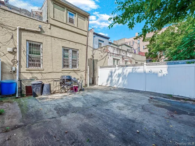 a view of a house with large outdoor space