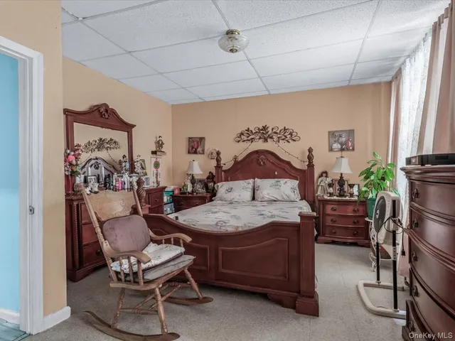 a bedroom with furniture and a bed