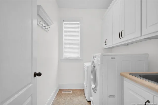 a view of a storage and utility room with a window