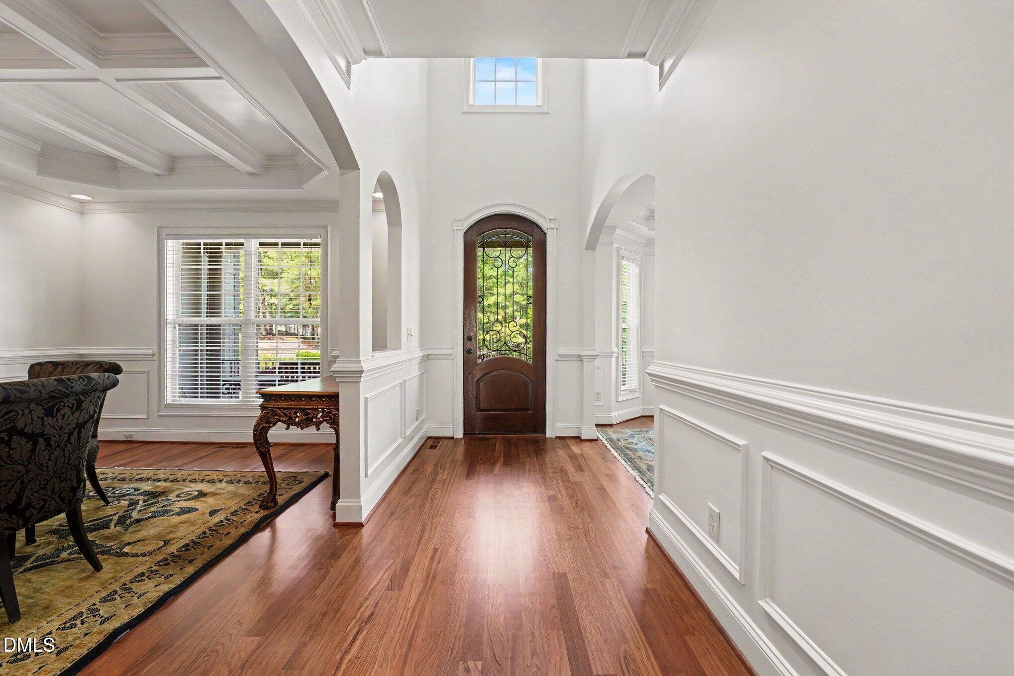 1729 Frenchwood Drive Raleigh, NC 27612 - Photo 2 of 46 a view of a livingroom with wooden floor and furniture