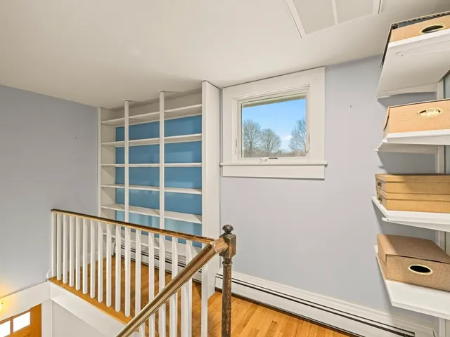 a view of a hallway with workspace