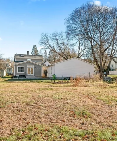 a backyard of a house with lots of green space