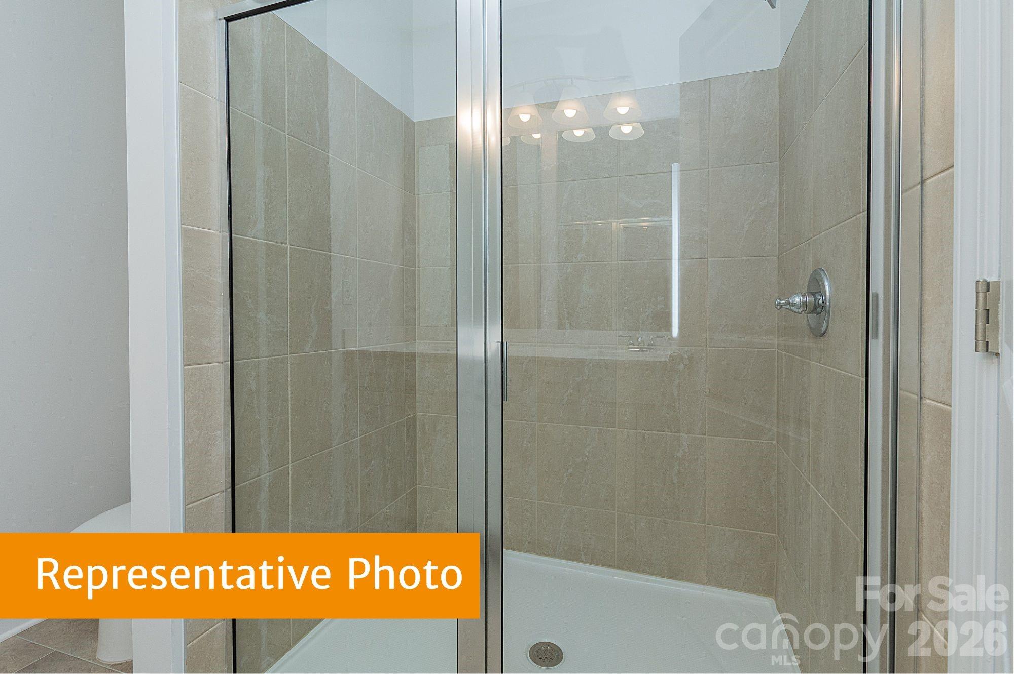5613 Ringneck Road Charlotte, NC 28216 - Photo 17 of 29 a bathroom with a shower