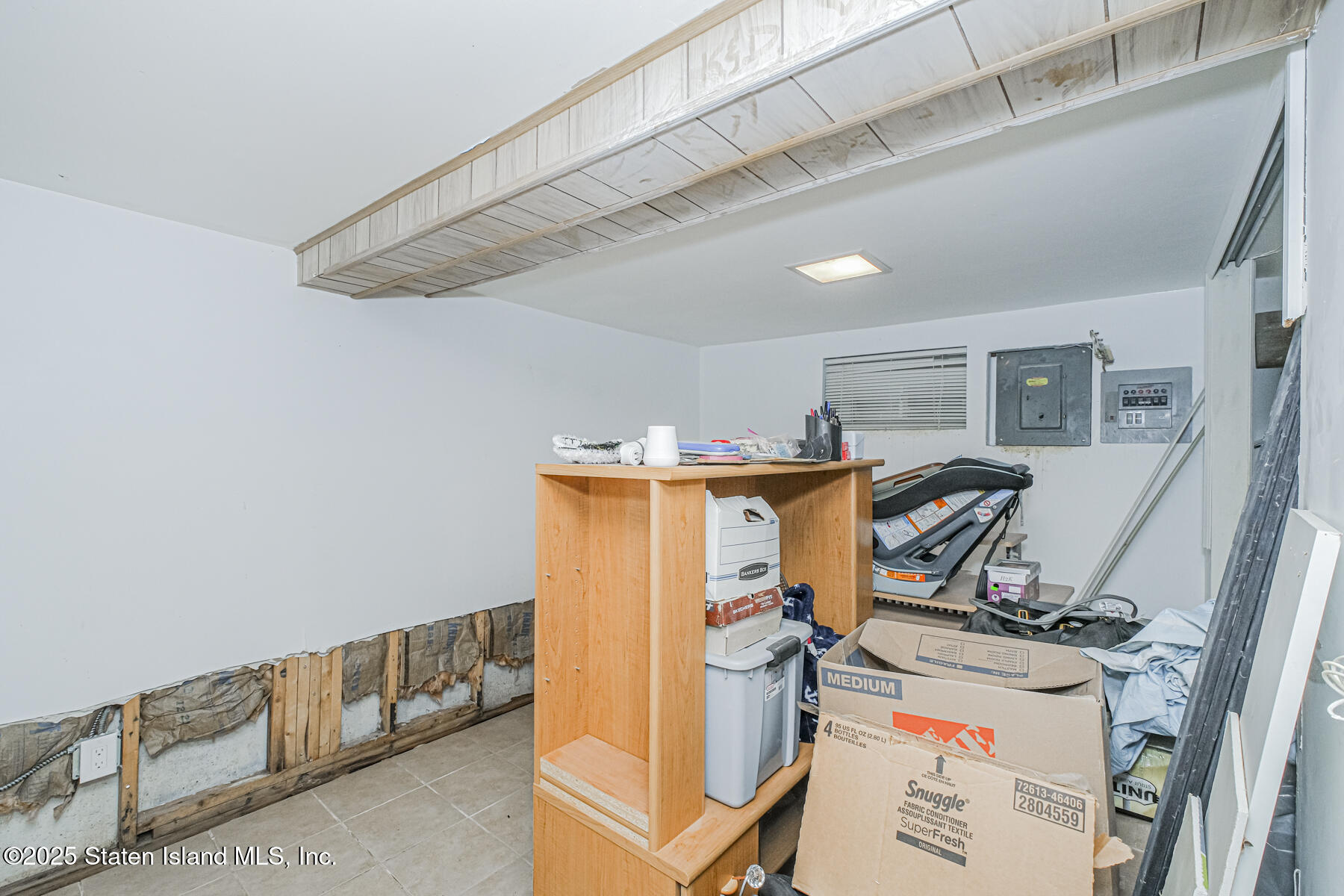537 Annadale Road Staten Island, NY 10312 - Photo 20 of 27 a room with storage and utility
