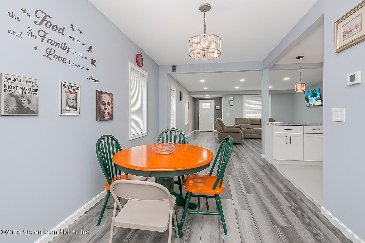 537 Annadale Road Staten Island, NY 10312 - Photo 5 of 27 a view of a dining room with furniture and wooden floor
