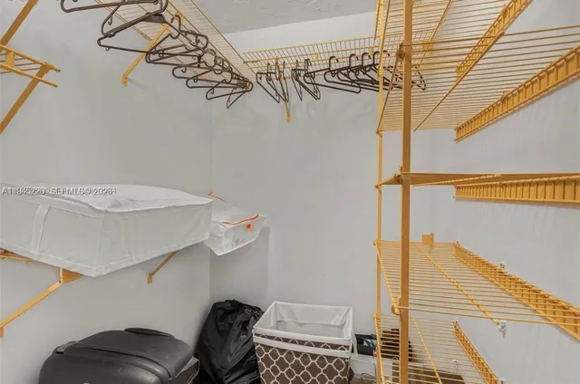 a view of a balcony with furniture