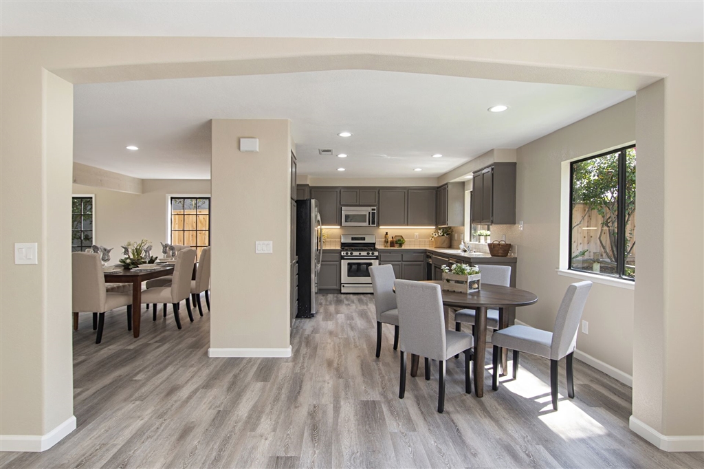 266 Sierra Ridge Drive Encinitas, CA 92024 - Photo 24 of 24 Open floor plan with excellent social connection from family room to kitchen to living room and backyard.