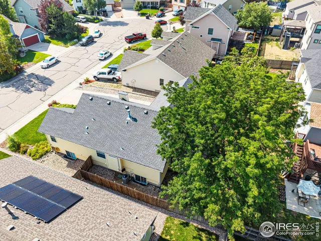 a view of a swimming pool with a yard
