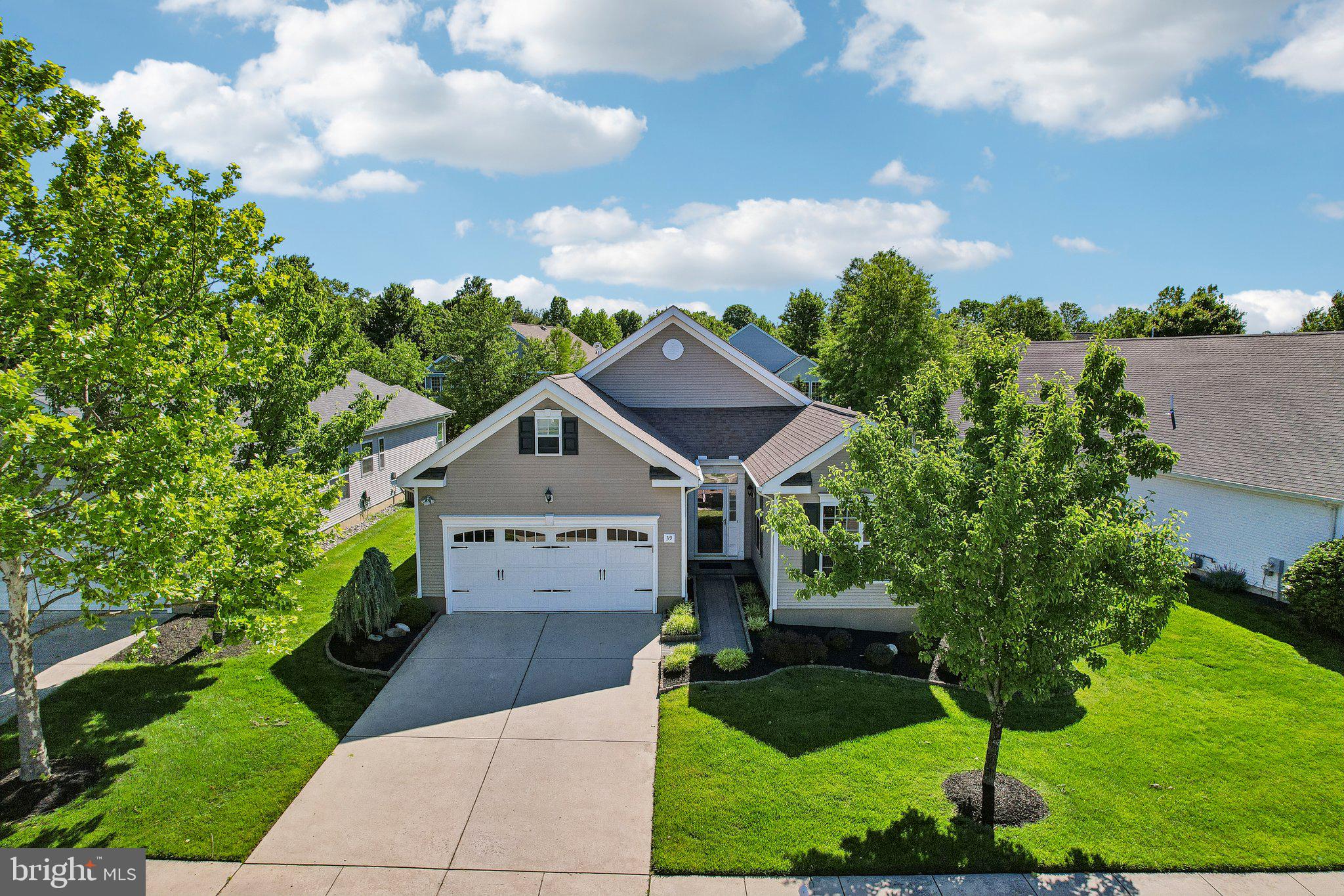 39 Danbury Road Swedesboro, NJ 08085 - Photo 44 of 62 a front view of a house with garden