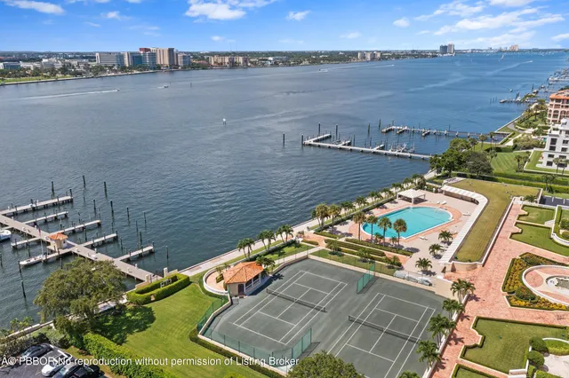 an aerial view of a house with a ocean view
