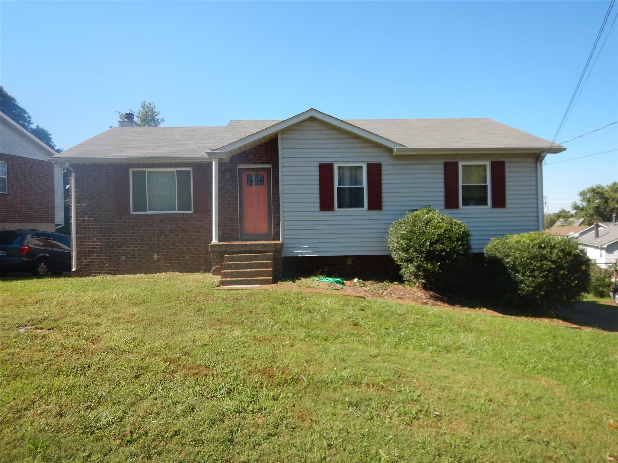 1104 Jacksons View Road Hermitage, TN 37076 - Photo 1 of 1 a front view of house with yard and trees around