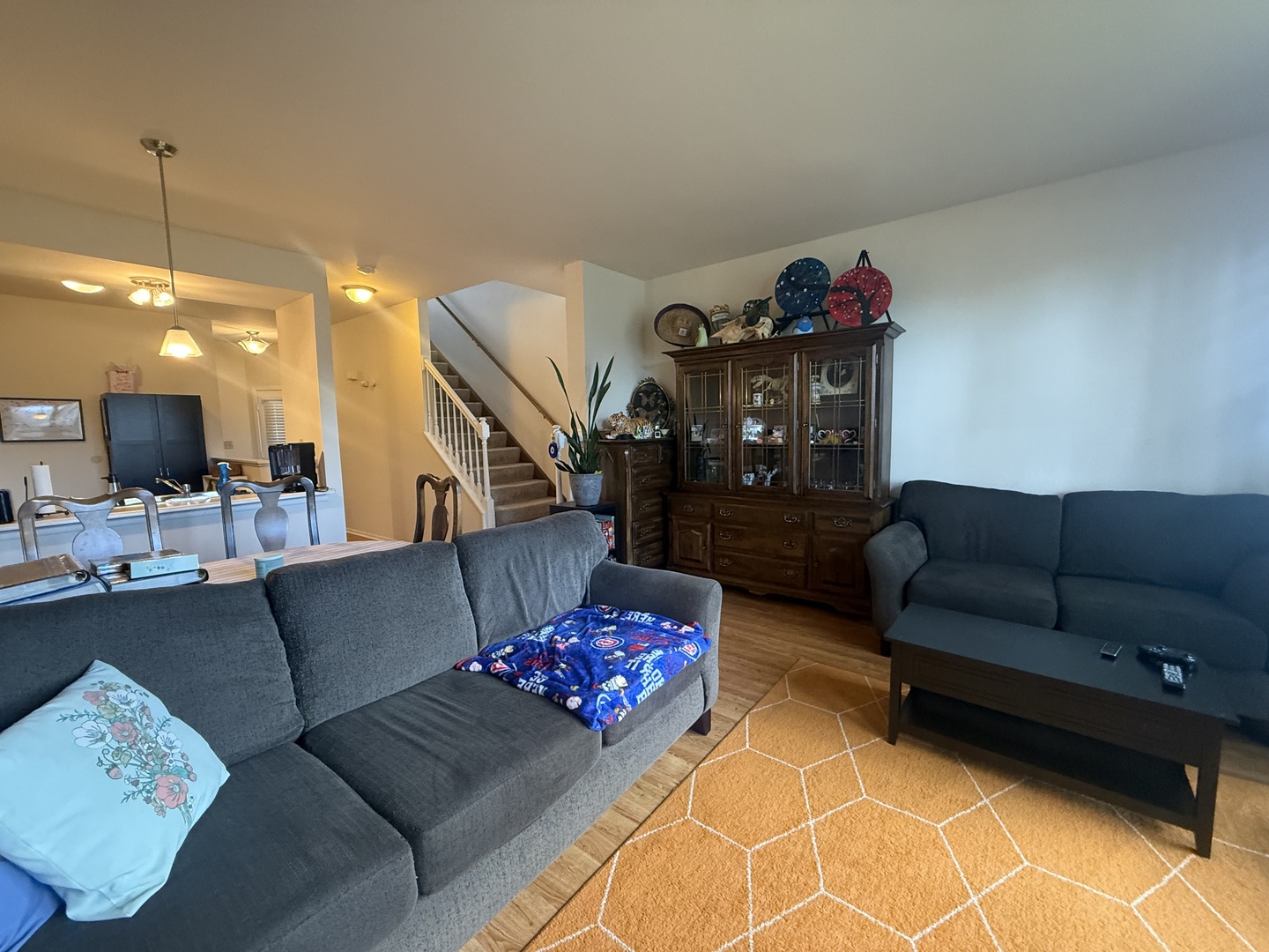 348 Fallbrook Court Schaumburg, IL 60107 - Photo 8 of 21 a living room with furniture and a flat screen tv