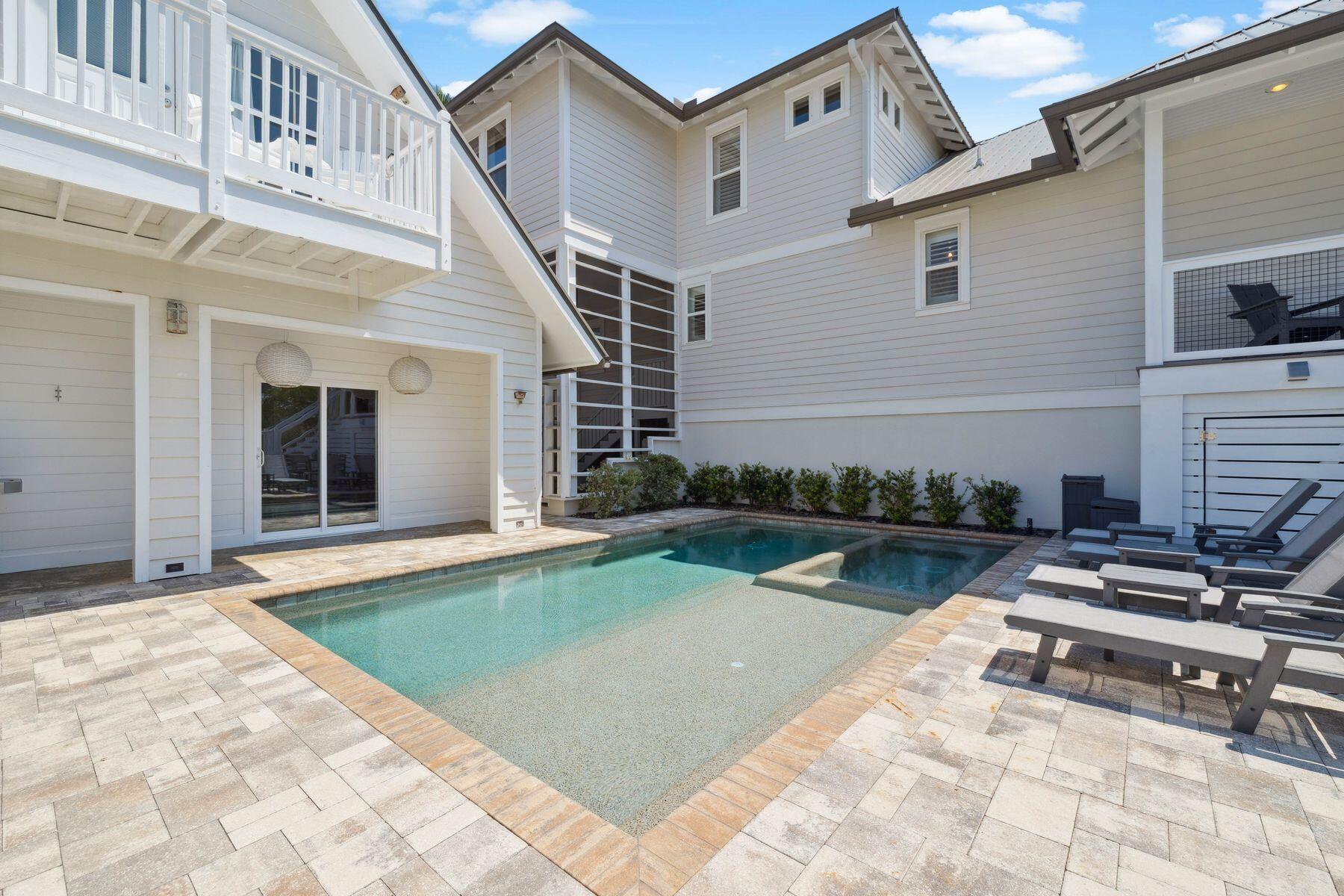 1984 South Co Highway 83 Santa Rosa Beach, FL 32459 - Photo 12 of 70 a view of a house with backyard and sitting area