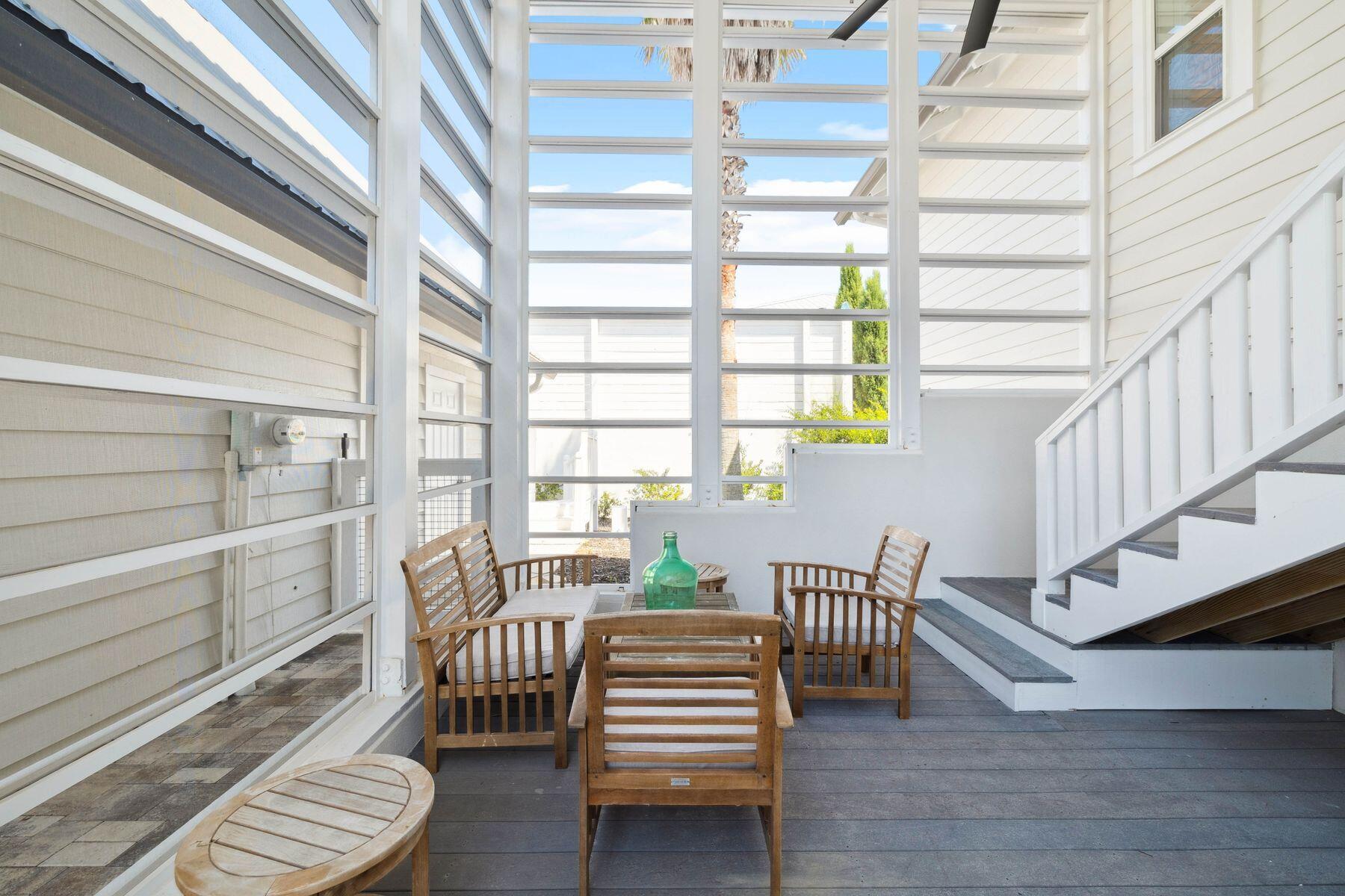 1984 South Co Highway 83 Santa Rosa Beach, FL 32459 - Photo 16 of 70 a view of a dining room with furniture and wooden floor