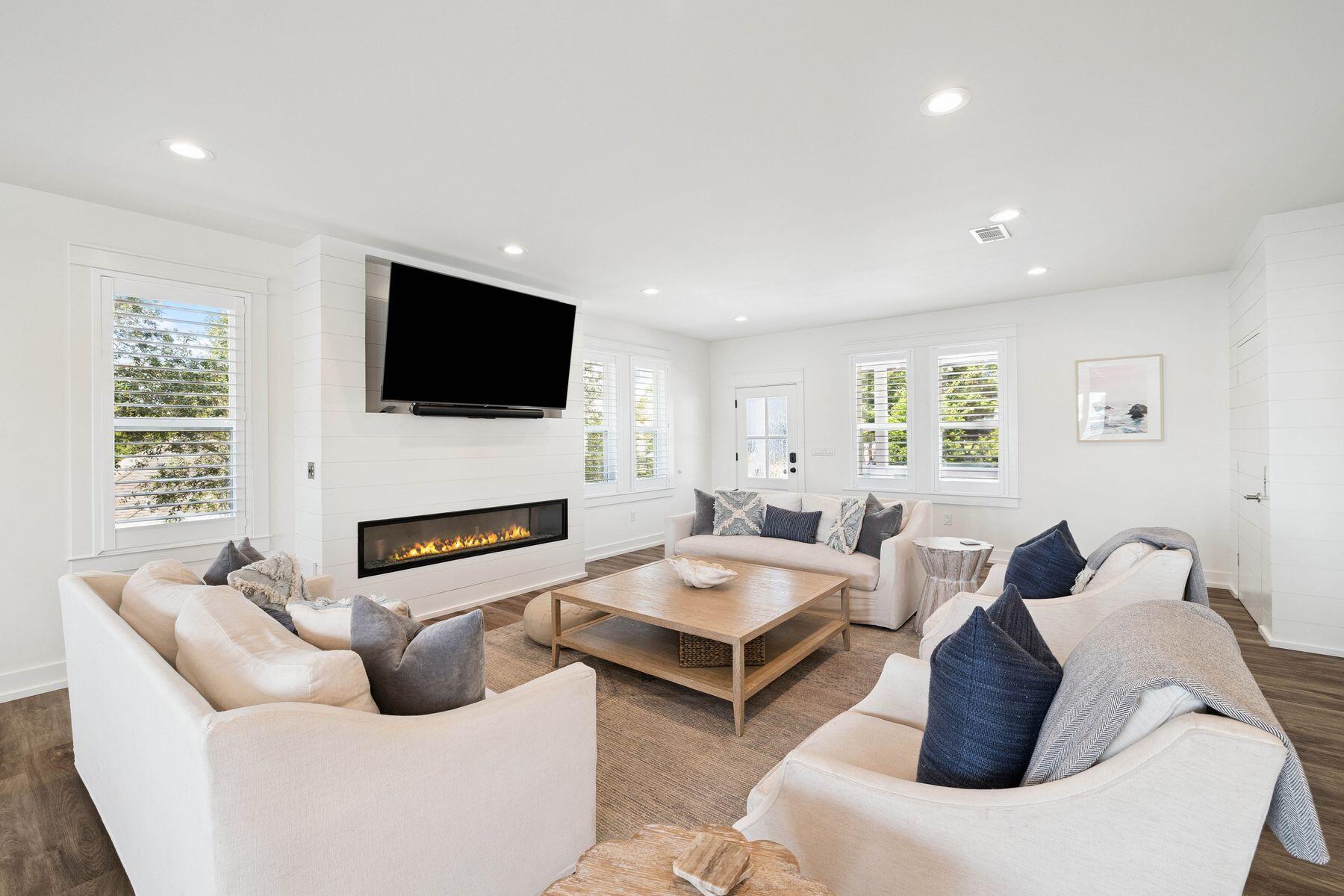 1984 South Co Highway 83 Santa Rosa Beach, FL 32459 - Photo 19 of 70 a living room with furniture and a flat screen tv