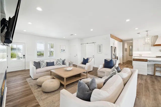 a kitchen with stainless steel appliances white cabinets and a stove