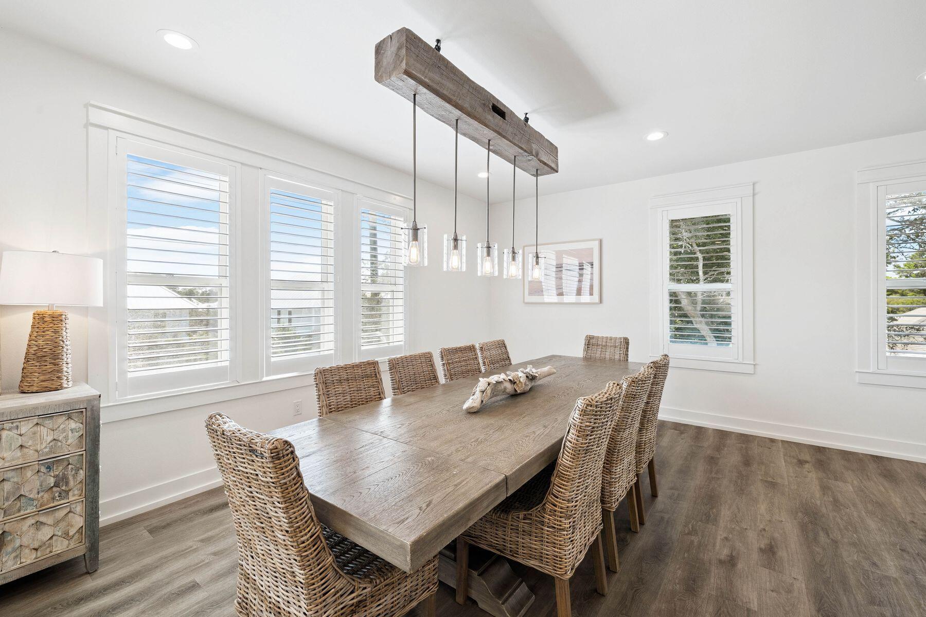 1984 South Co Highway 83 Santa Rosa Beach, FL 32459 - Photo 21 of 70 a view of a dining room with furniture and wooden floor