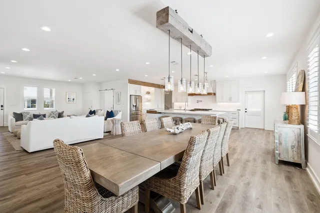 a kitchen with cabinets and stainless steel appliances