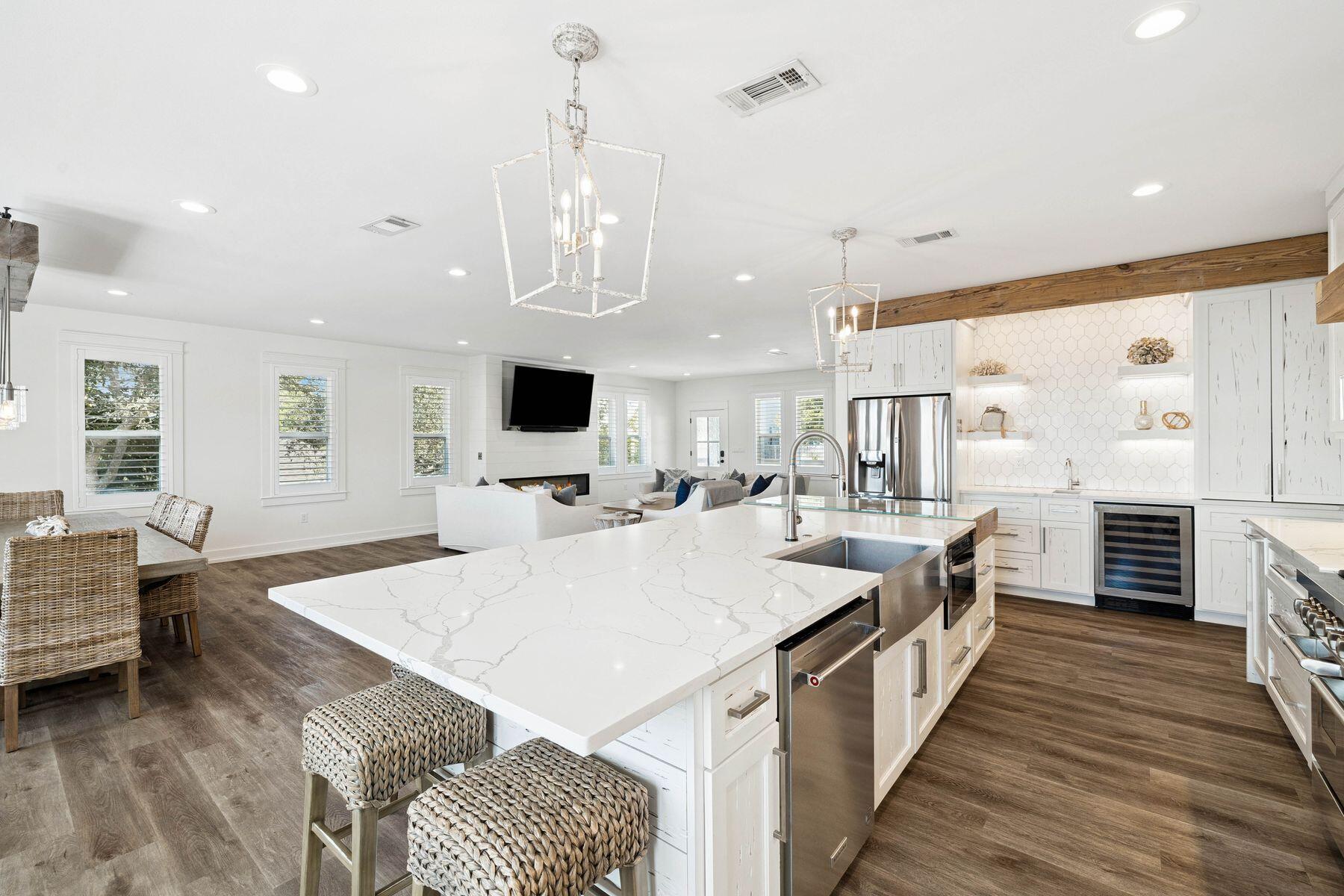 1984 South Co Highway 83 Santa Rosa Beach, FL 32459 - Photo 26 of 70 a large kitchen with a table and chairs