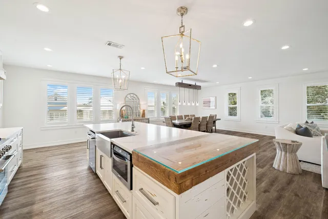 a dining room with furniture and windows