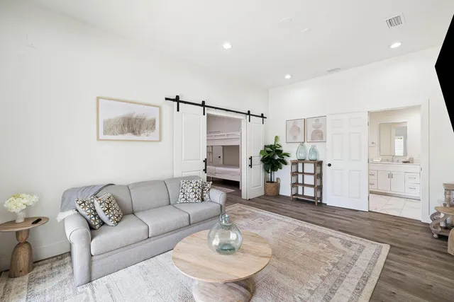 a bathroom with a glass shower door