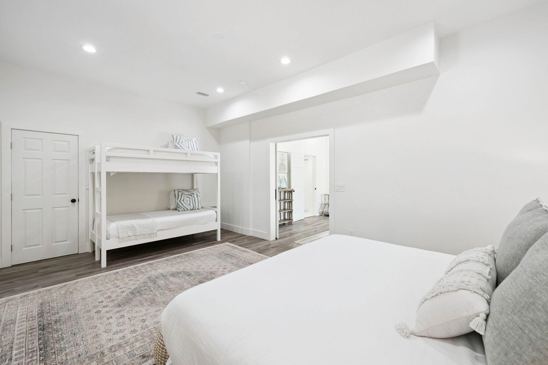 1984 South Co Highway 83 Santa Rosa Beach, FL 32459 - Photo 51 of 70 a bedroom with a bed and a mirror