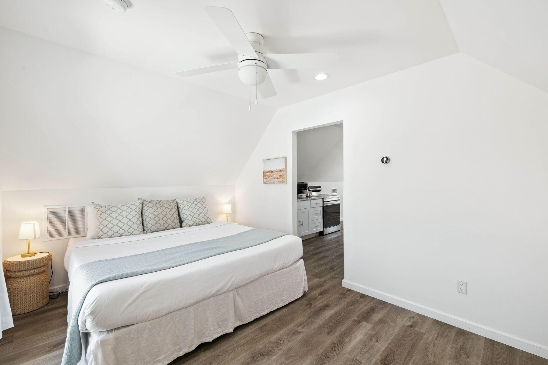 1984 South Co Highway 83 Santa Rosa Beach, FL 32459 - Photo 54 of 70 a bedroom with a bed and a chandelier