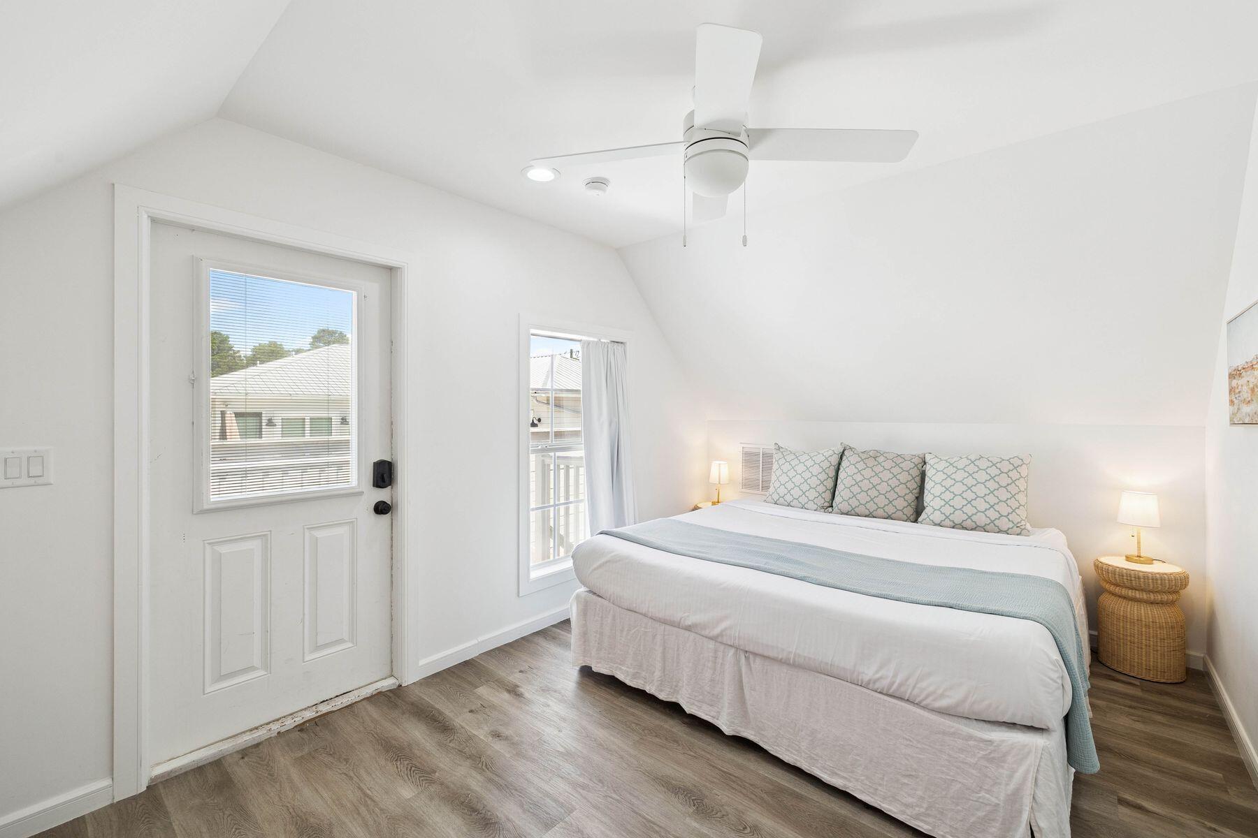 1984 South Co Highway 83 Santa Rosa Beach, FL 32459 - Photo 55 of 70 a bedroom with a bed and a painting on the wall