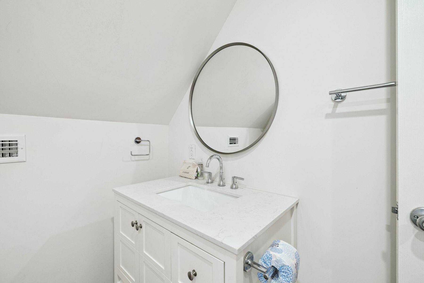 1984 South Co Highway 83 Santa Rosa Beach, FL 32459 - Photo 56 of 70 a bathroom with a sink and a mirror