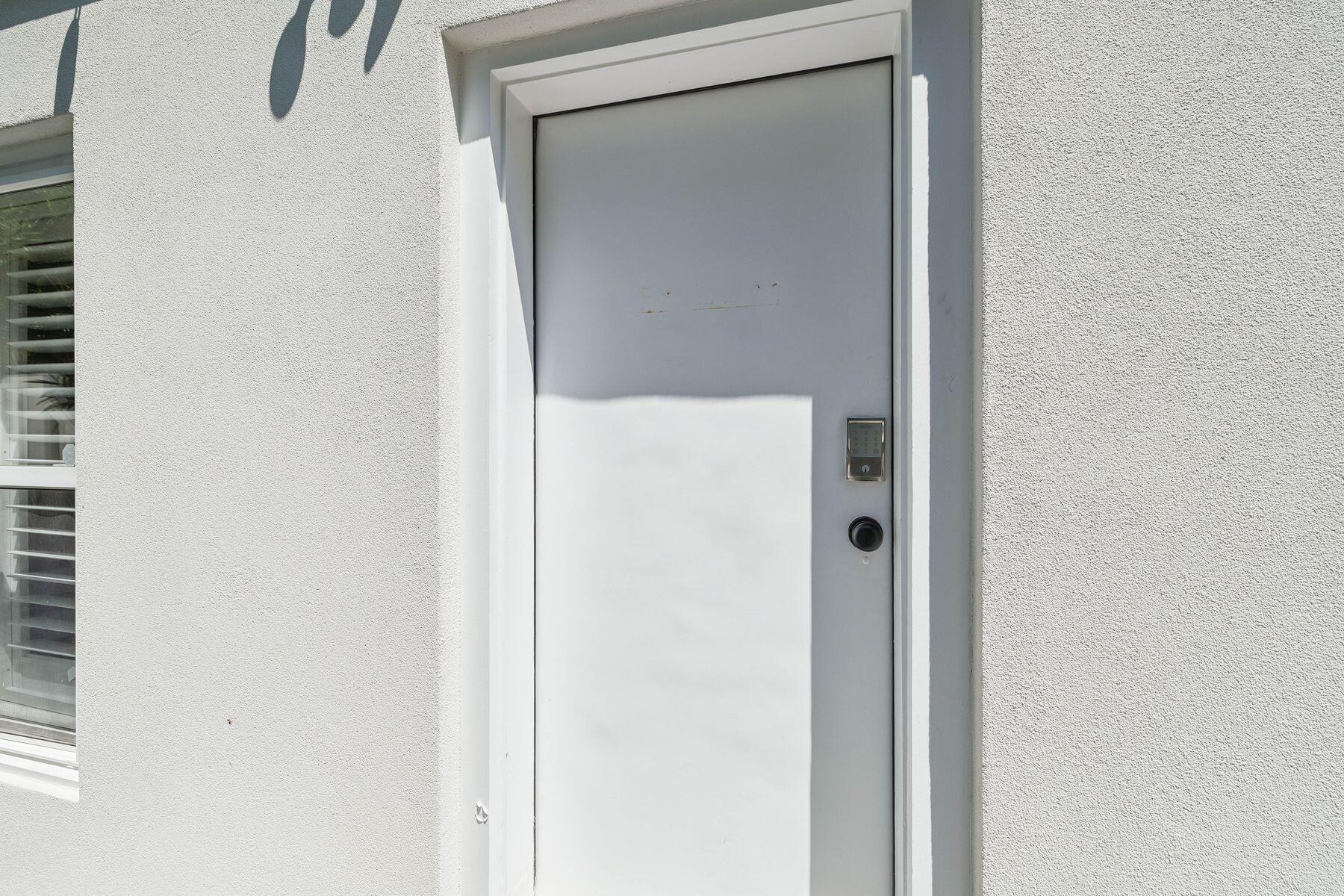 1984 South Co Highway 83 Santa Rosa Beach, FL 32459 - Photo 64 of 70 a close view of a utility room with cabinet and mirror