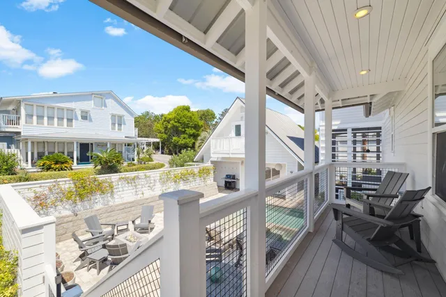 a view of a kitchen with kitchen island and a stove