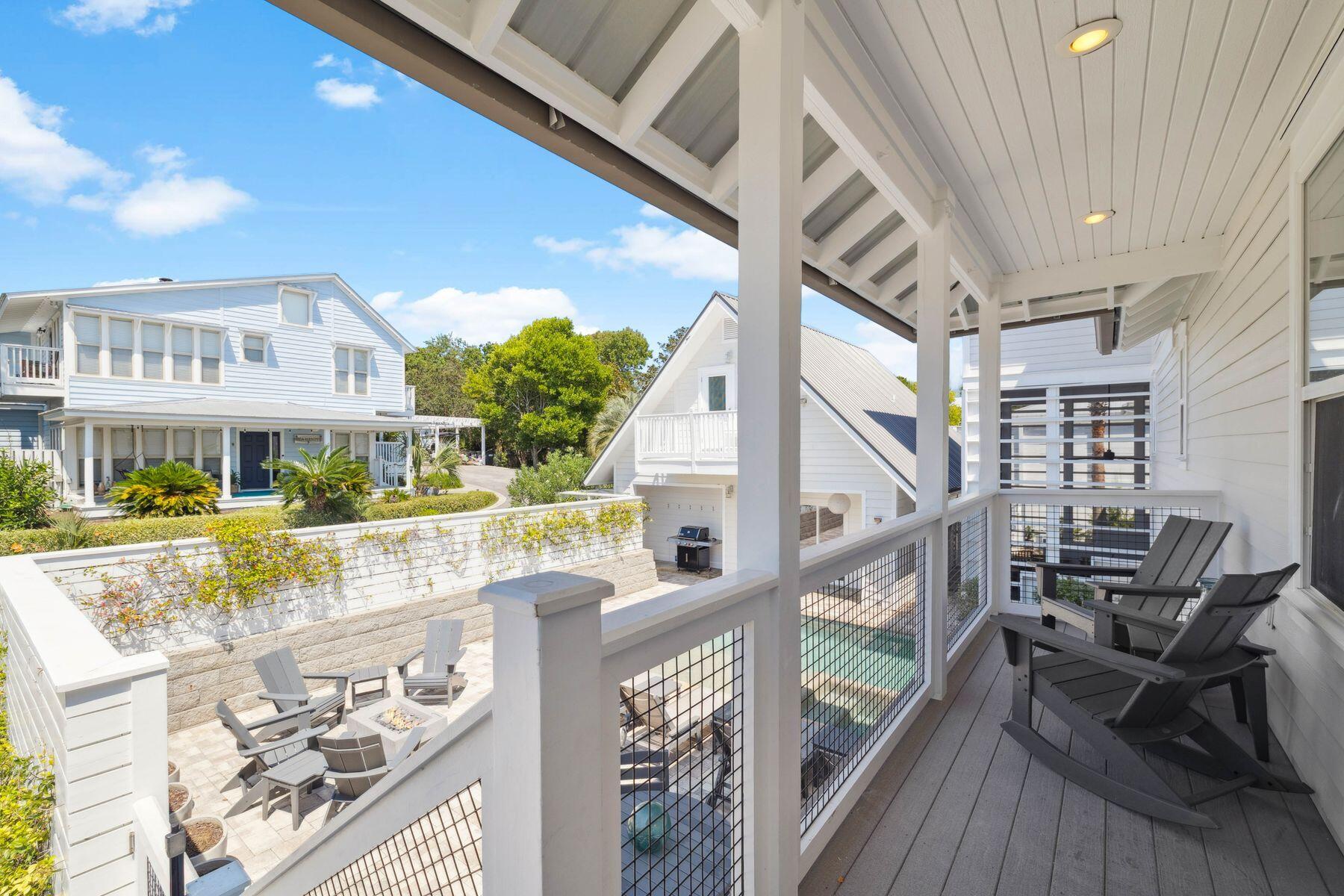 1984 South Co Highway 83 Santa Rosa Beach, FL 32459 - Photo 9 of 70 a view of an chairs and table in the balcony