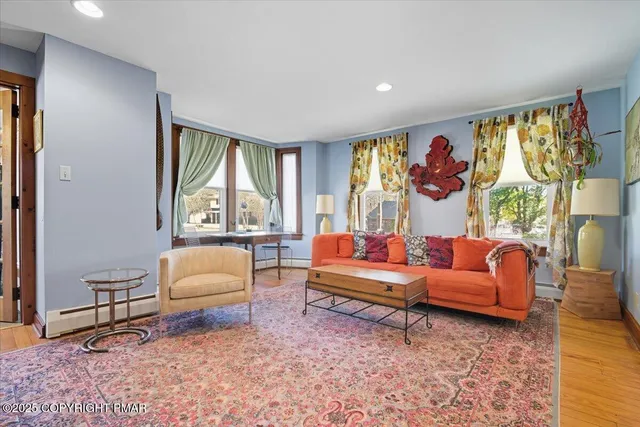 a kitchen with stainless steel appliances granite countertop a refrigerator a stove top oven a sink and dishwasher